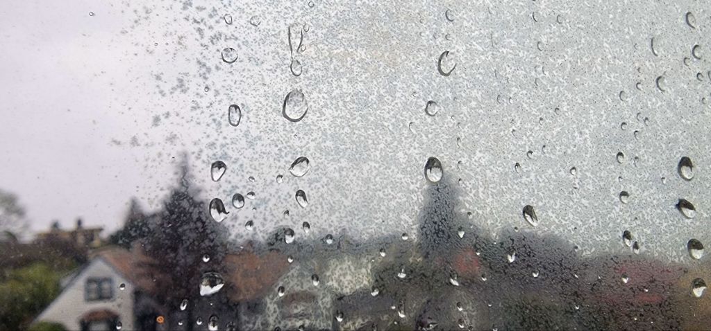 Rain drops on a dirty window