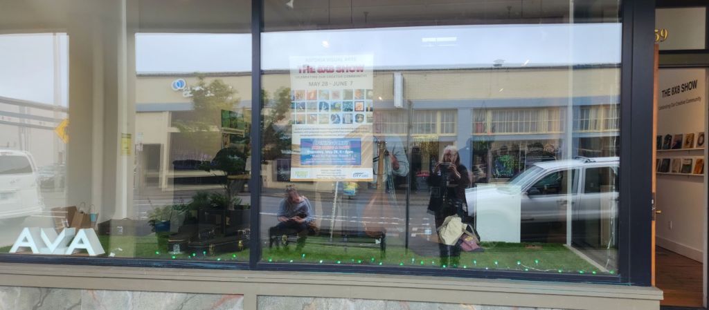 Reflections in a gallery window