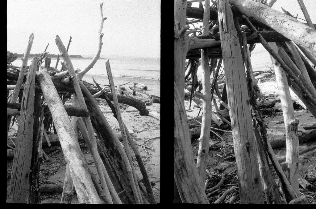 2 black and white photos of driftwood that has been piled into a sort of structure