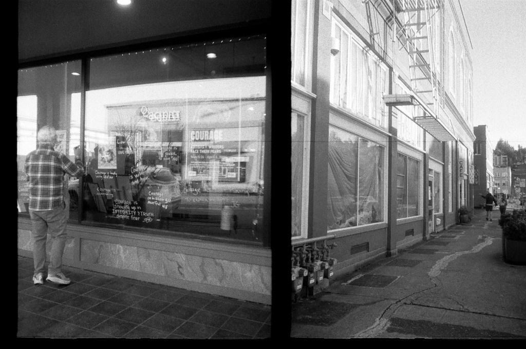 2 black and white photos of 2 different buildings in Astoria; the way the diptych is arranged it looks like one building